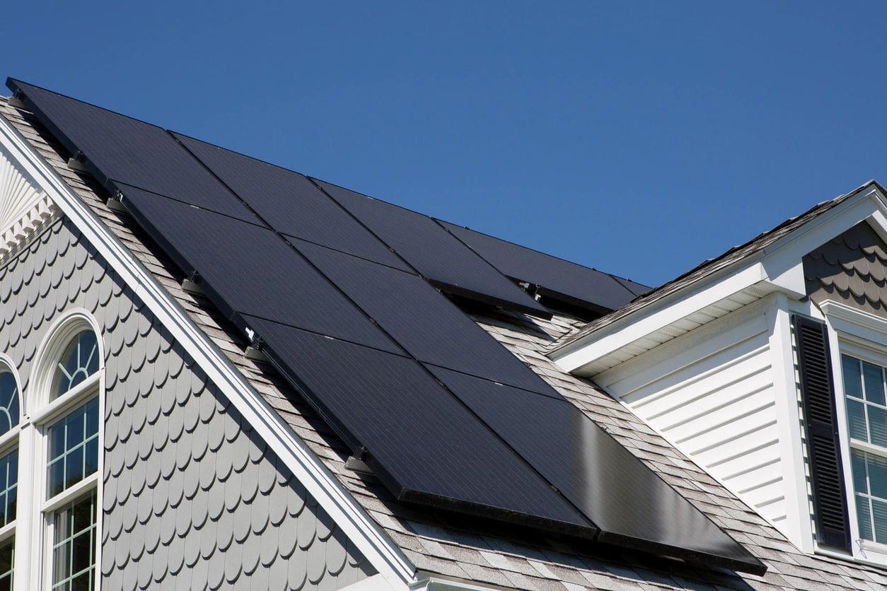 A roof with several solar panels on it.