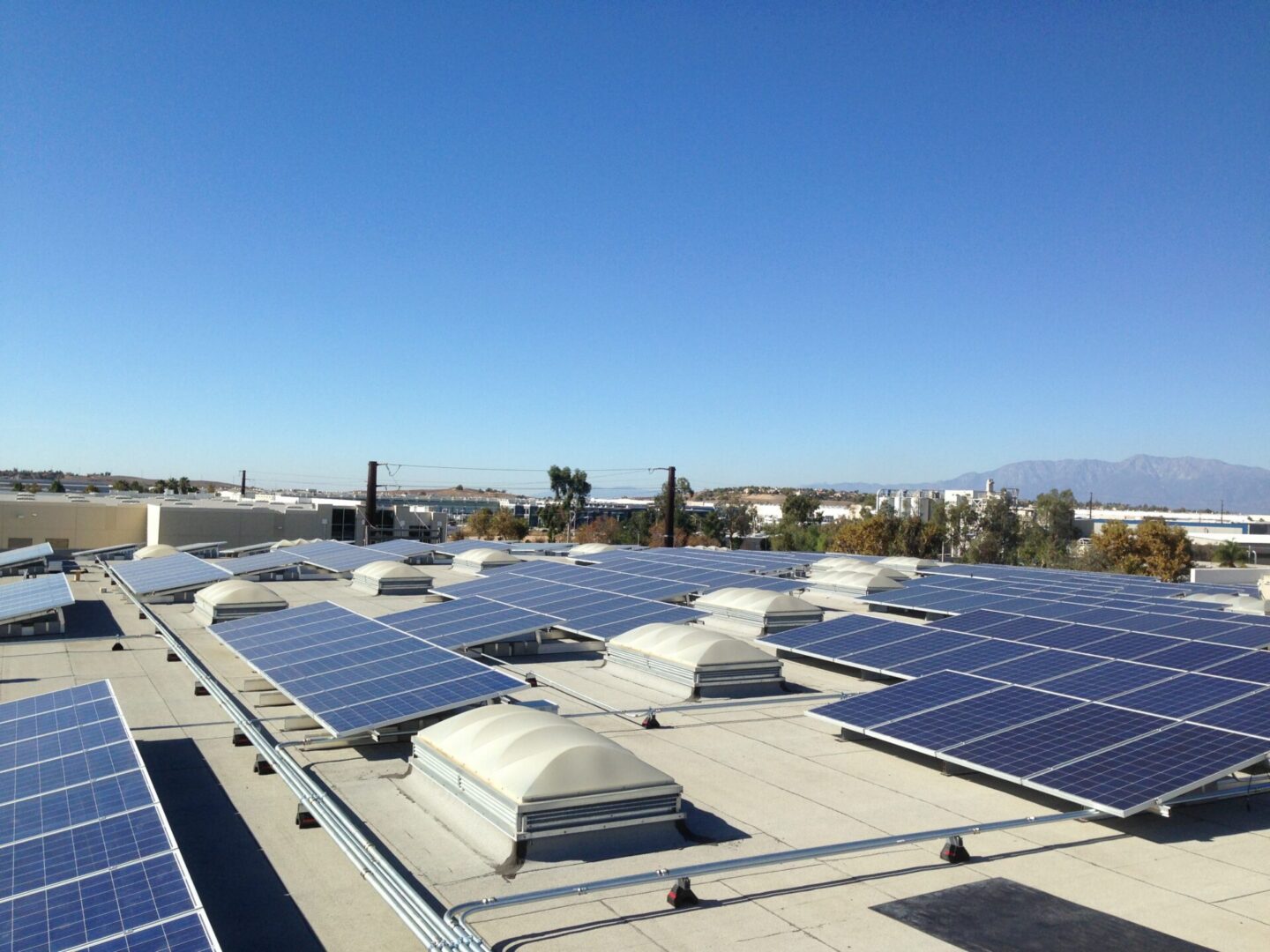 Commercial solar panel installation on a flat roof